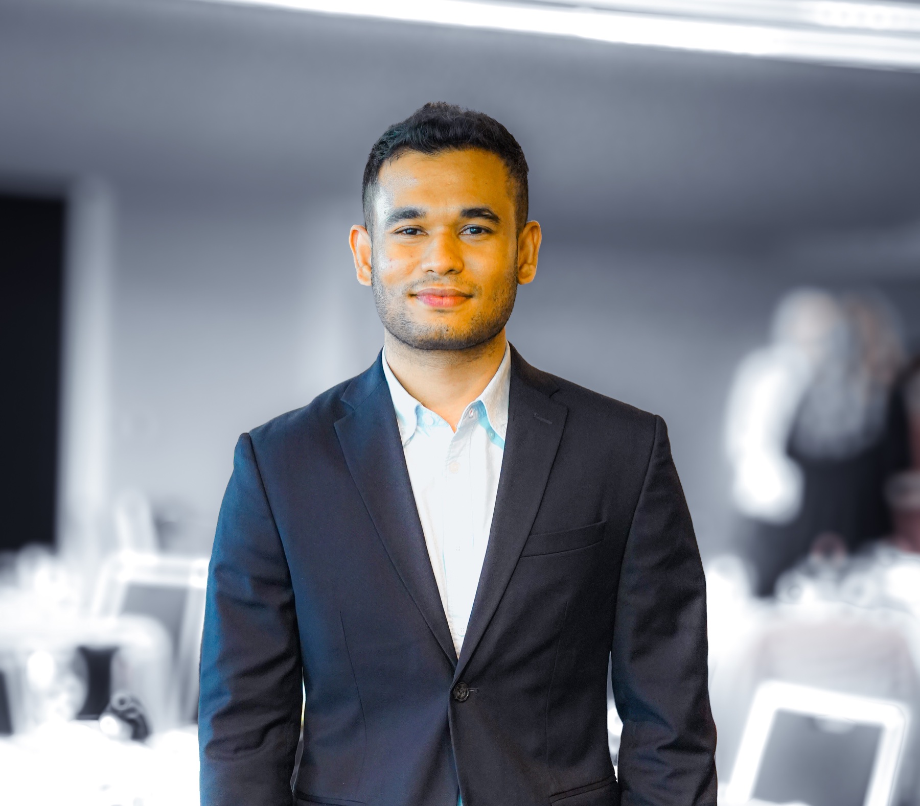 Kawser Alam in a dark suit